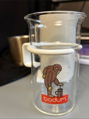 Vintage Bodum Clear Glass Mug with Brown Monkey and White Handle Accent